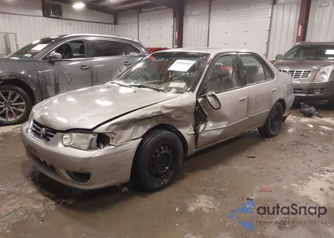 2001 Toyota Corolla Le z USA, uszkodzony, nr VIN 2T1BR12E61C453995